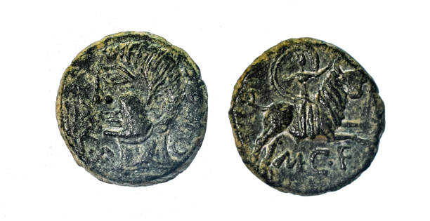 istock Ancient Roman bronze coin. Obverse and reverse - blank background. 1409259470