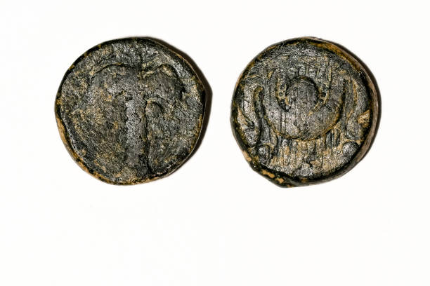 istock Ancient Roman bronze coin. Obverse and reverse - blank background. 1409259473