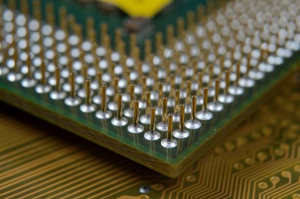 istock microprocessor on the background of the microcircuit of the motherboard. 1409260494