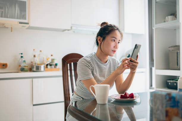 istock Starting the day with a scroll through the social network 1409263828
