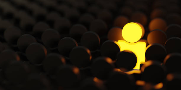 istock To Be Different Concept, One Man Glowing Among Other People in Dark Condition 1409264174