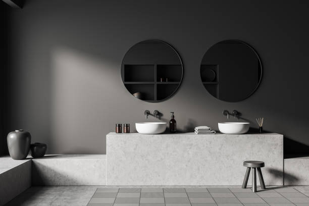 istock Grey bathroom interior with sink and mirror, stool and accessories 1409268219