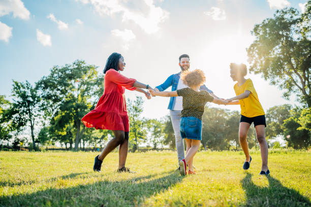 istock Multi ethnic family playing ring around the rosy 1409268246