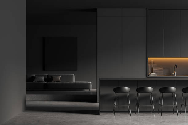 istock Grey kitchen interior with sofa and countertop, lounge zone and eating area 1409268509