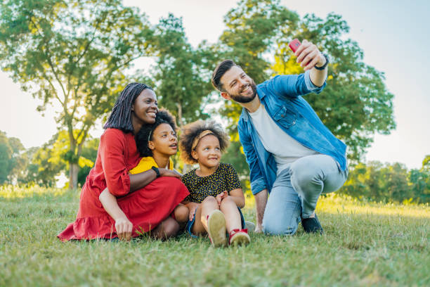 istock Multiracial family taking a selfie 1409268813