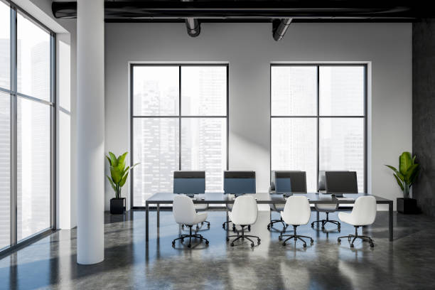 istock Office interior with pc computer, desk and panoramic window on city view 1409268882