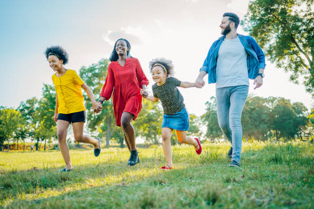 istock Multiracial family in the park 1409268935
