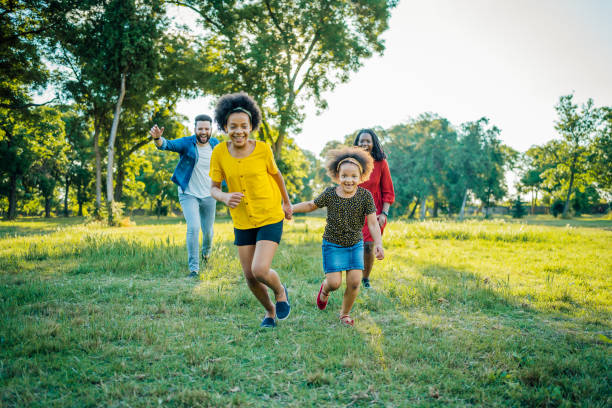 istock Playful multiracial family in the park 1409268982