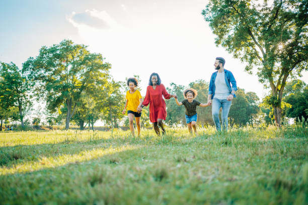 istock Multiracial family in the park 1409269740