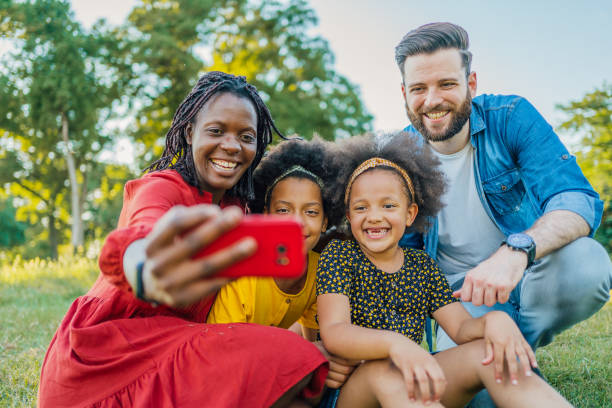 istock Multiracial family taking a selfie 1409269807