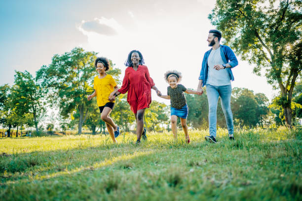 istock Multiracial family in the park 1409269905