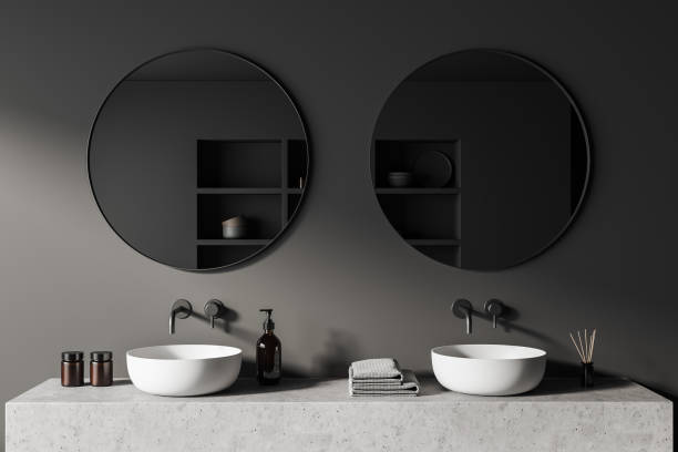 istock Grey bathroom interior with sink and mirror, accessories on deck 1409270244