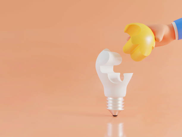istock Cartoon Hand holding jigsaw of shaped light bulbs, problem solving concepts and teamwork concepts, 1409270393