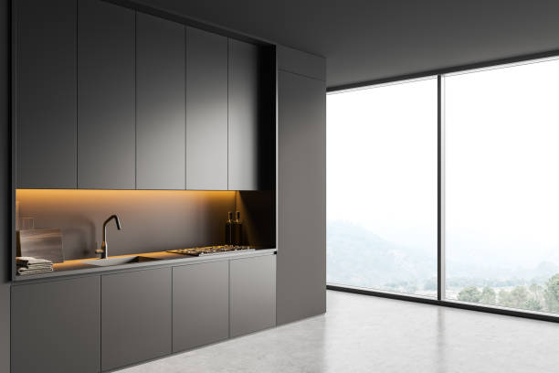 istock Grey kitchen interior with shelves and appliances, panoramic window 1409270461