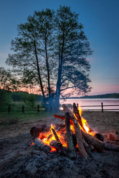 istock Bonfire by the lake after sunset, summer in Poland 1409271048