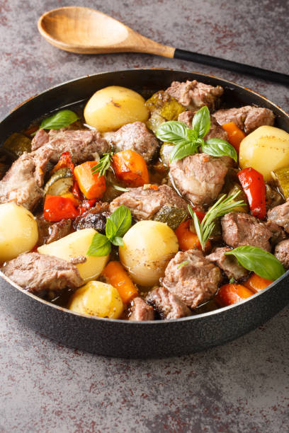 istock Peka Croatian Meat and Vegetable Stew close-up. Vertical 1409274630