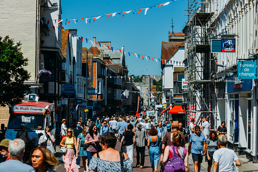 Canterbury, UK - July 15, 2022: The High Street in the historic city centre, Canterbury, Kent