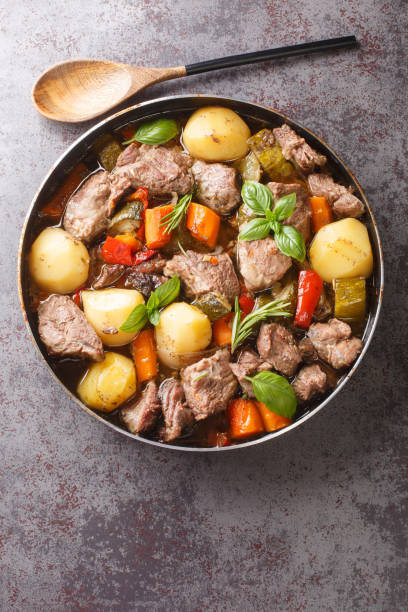 istock Peka Croatian Meat and Vegetable Stew close-up. Vertical top view 1409274670