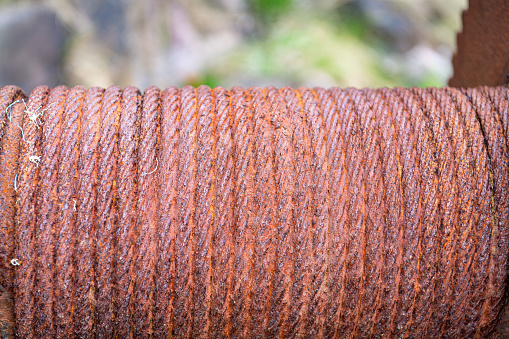 Rusty boat winch cable on the reel at Minard Castle, County Kerry, Ireland