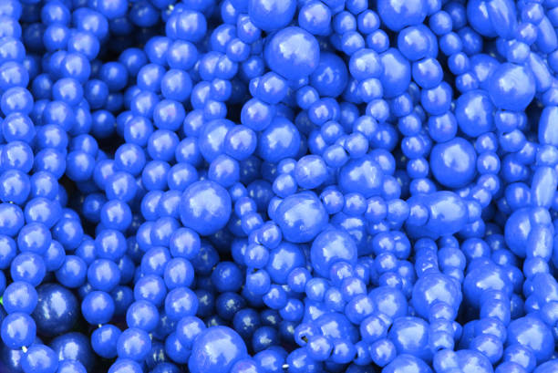 istock blue background made of wooden blue beads 1409281963