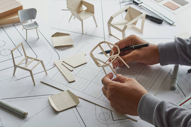 istock Designer sketching drawing design development product plan draft chair armchair Wingback Interior furniture prototype manufacturing production. designer studio concept . 1409284179