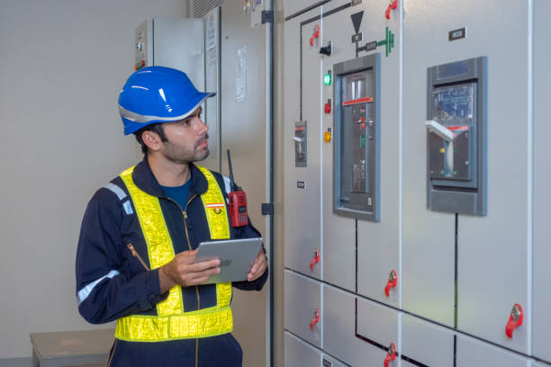 istock Engineer under checking the industry chilled water fan coil unit air conditioner is water cooling tower air chiller HVAC system of large industrial building to control air system 1409284923
