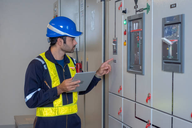 istock Engineer under checking the industry chilled water fan coil unit air conditioner is water cooling tower air chiller HVAC system of large industrial building to control air system 1409285224