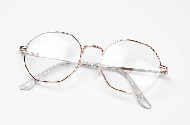 istock Stylish eyeglasses on a white background. Iron frame glasses 1409286081