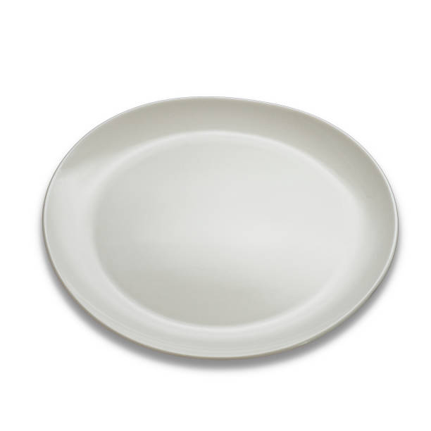 istock Porcelain glass plate on white background 1409286714