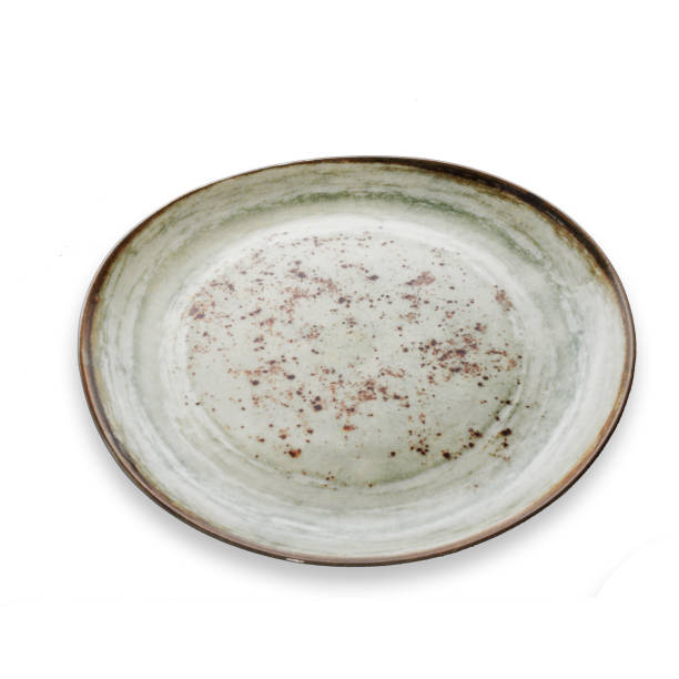 istock Porcelain glass plate on white background 1409287428