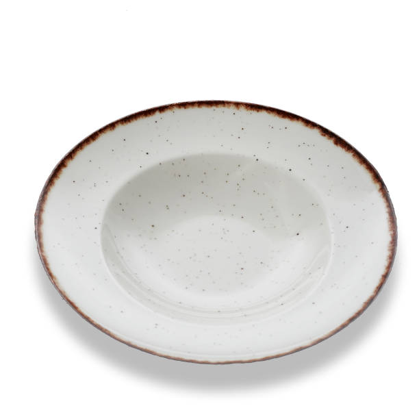 istock Porcelain glass plate on white background 1409287496