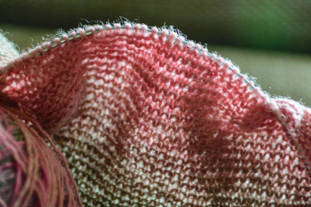 istock warm knitted material fabric sweater, texture blurred background 1409289924