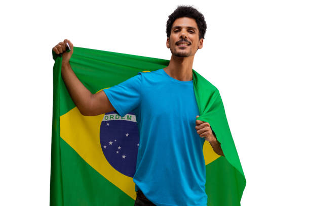 istock Holding Brazil Flag, Black Man With Flag isolated. 1409291800