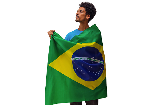 Holding Brazil Flag, Black Man With Flag isolated.. Flag and Independence Day Concept Image.