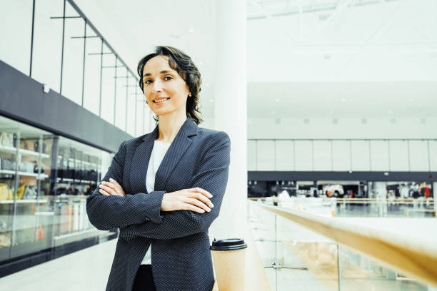 istock Successful Middle-aged business woman looks into camera 1409291907