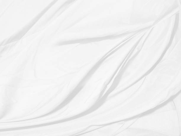 istock smooth abstract fashion textile Clean woven beautiful soft fabric curve shape decorative white and gray background 1409294897