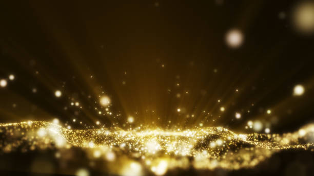 Yellow gold light ray shine glow particle abstract background.