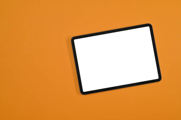 istock Modern digital tablet mockup on yellow background with blank white screen, Photo mockup with clipping path. 1409296188