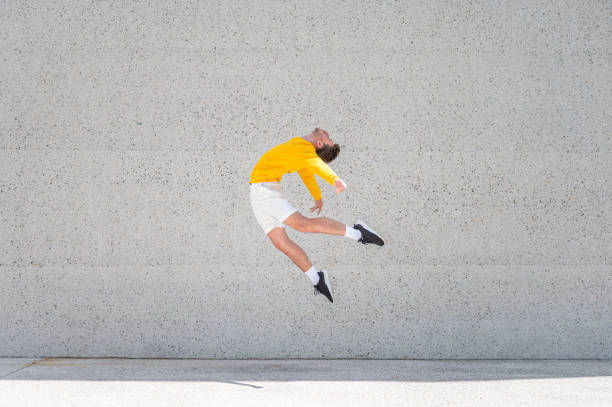 istock Male dancer in a jump 1409297777