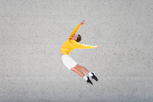 istock Male dancer in a jump 1409297781