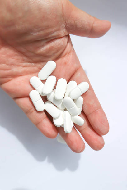 istock pharmaceutical or medicine or pills, tablets and capsules 1409297874