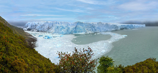 El Calafate, Argentina, November 3, 2019: View of the Perito Moreno glacier on Lake Argentino. The glacier is named after the explorer Francisco Moreno, a pioneer who studied the region in the 19th century.