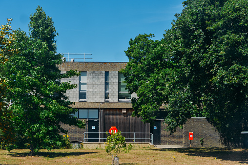 Exterior of a public school building in summer in Grängesberg, Sweden.