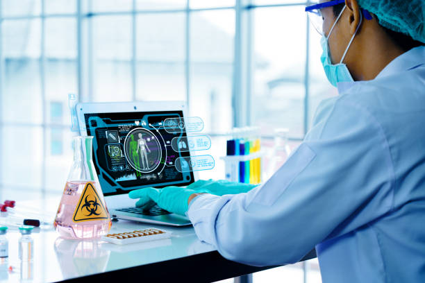 Scientists are using laptop to research cancer or covid treatment in lab. medical human body analysis technology. Scientific research with intelligent AI system innovation Develop an antiviral vaccine los científicos están usando computadoras portátiles para investigar el cáncer o el tratamiento de covid en el laboratorio. tecnología médica de análisis del cuerpo humano. investigación científica con innovación de sistemas de ia inteligentes de