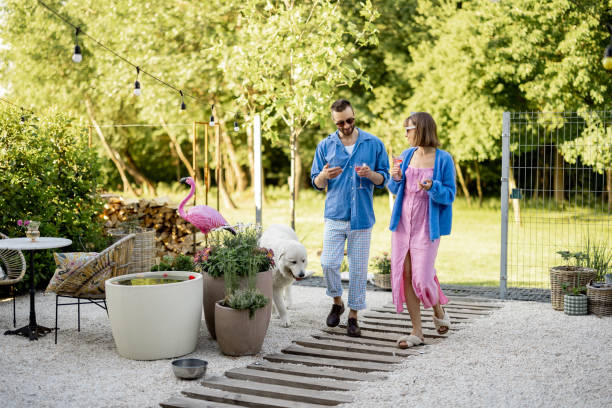 istock Stylish couple spend summer time at the backyard 1409308319