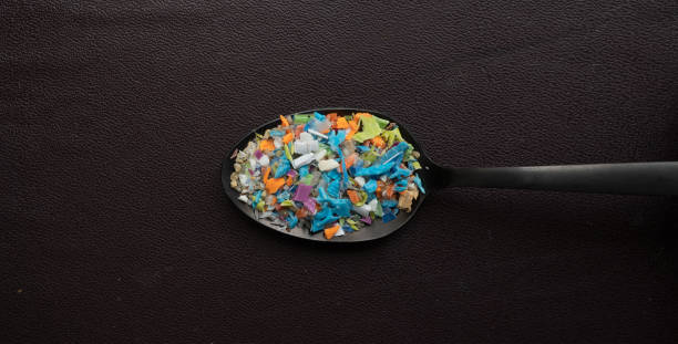 Macro shot on a bunch of microplastics that cannot be recycled stock photo