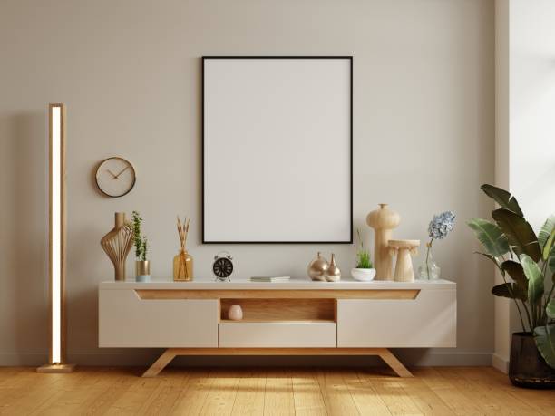 istock Mockup black poster frame on cabinet in modern interior background. 1409310721