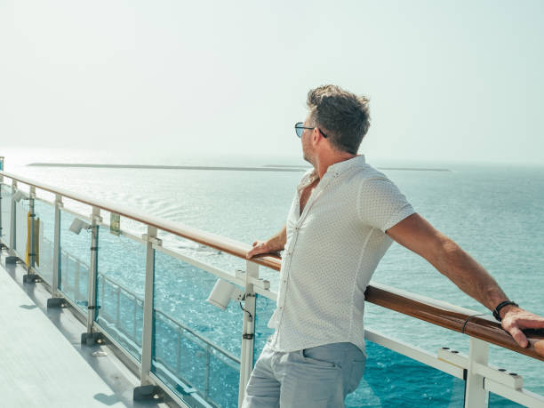 istock Fashionable man standing on the empty deck 1409311028