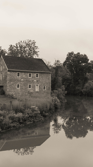 Mill house setting alongside a moving river