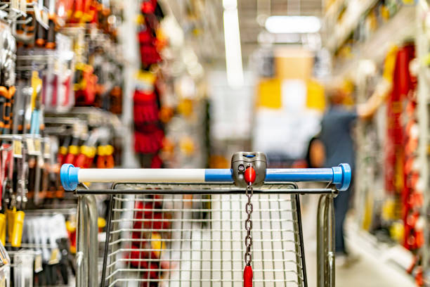 istock A shopping cart by a store shelf in a hardware store 1409316174